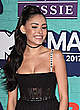 Madison Beer shows cleavage in black dress pics