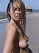Camille Rowe topless and nude on a beach pics