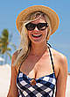 Kirsten Dunst in swimsuit on a beach set pics