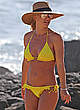 Britney Spears in yellow bikini on a beach pics