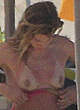 Doutzen Kroes naked pics - changing on a beach shows tits