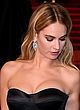Lily James busty in black strapless gown pics