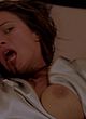 Rhona Mitra showing her big tits in movie pics