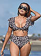Laura Simpson in leopard bikini on a beach pics