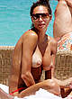 Lilly Becker sunbathing topless on a beach pics