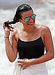 Lea Michele in black swimsuit on a beach pics