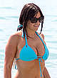Claudia Romani cleavage in blue bikini pics