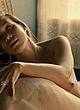 Nikol Kollars showing her breasts in bed pics