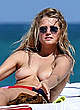 Toni Garrn topless on a beach in miami pics
