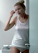 Emily VanCamp in a white panty and bare back pics