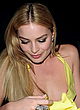 Margot Robbie hot nip-slip in a yellow gown pics