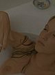 Ludivine Sagnier nude tits in bathtub & smoking pics