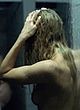 Olga Kurylenko nude tits in public shower pics