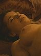 Rain Elwood lying topless, showing breasts pics