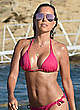 Sylvie Meis in pink bikini on a beach pics