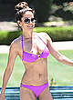Brooke Burke in magenta bikini poolside pics