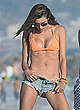Alessandra Ambrosio in orange bikini on a beach pics