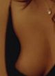 Elizabeth Berkley naked pics - flashing her right breast