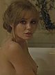 Angelina Jolie exposing nude tits in bathtub pics