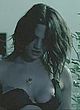 Asia Argento naked pics - showing her left boob outdoor