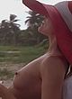 Rene Russo sunbathing topless outdoor pics