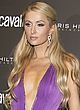 Paris Hilton flashes panties & big cleavage pics