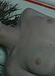 Christina Ricci naked pics - lying on table & showing tits
