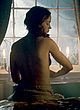 Emily Blunt naked pics - sitting & showing side-boob