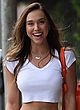 Alexis Ren showing tummy in a tiny top pics