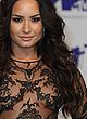 Demi Lovato visible nipples see-thru top pics