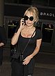 Pamela Anderson naked pics - see through at the airport