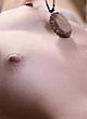 Mikaela Cochrane lying, showing her small tits pics