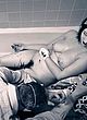 Erin R Ryan lying full frontal nude in tub pics