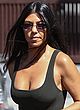 Kourtney Kardashian busty in a tank top outdoor pics