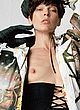 Milla Jovovich naked pics - topless in pop magazine