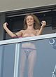 Rosie Huntington-Whiteley topless on balcony, photoshoot pics