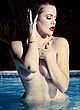 Khloe Kardashian night pool dip photo shoot pics