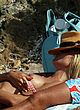 Heidi Klum sunbathing topless in italy pics