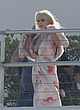 Lindsay Lohan naked pics - boob slip behind the scenes