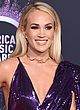 Carrie Underwood busty & leggy showing cleavage pics