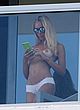 Laura Cremaschi naked pics - topless on a hotel balcony