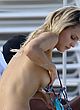 Joy Corrigan naked pics - bikini nip slip on the beach