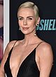 Charlize Theron showing huge cleavage & leggy pics