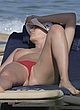 Bleona Qereti naked pics - sunbathing topless on beach