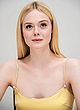 Elle Fanning cleavy & leggy in yellow gown pics
