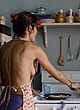 Audrey Tautou naked pics - showing sideboob in kitchen