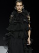 Bella Hadid rocks in black ruffle dress pics