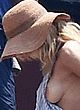 Gillian Anderson boob slip bikini malfunction pics