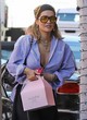 Rita Ora shows huge cleavage outdoor pics