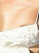 Jennifer Aniston sligh nip slip in dress pics
